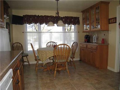 Kitchen. Large eat-in area, display cabinets with 