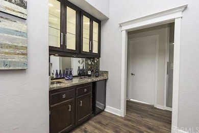 Remodeled bar in the Dining Room with granite coun