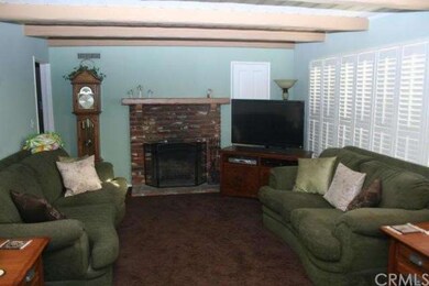 Spacious Living room with fireplace, newer carpeti