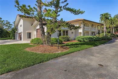 Mediterranean / spanish home with a garage, a balc
