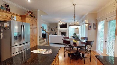 EAT-IN KITCHEN AND A FORMAL DINING ROOM...