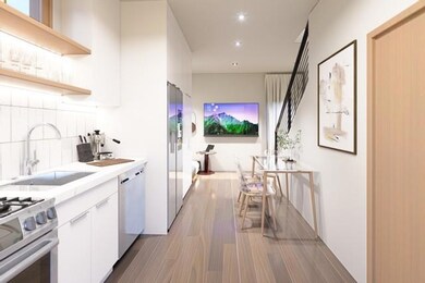 Kitchen featuring white cabinets, open shelves, l