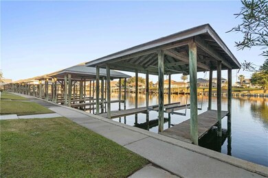 Covered and motorized boat lift.