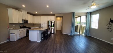 Kitchen with appliances with stainless steel finis