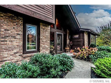 Exterior Front. Lush landscaping escorts your fami