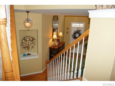 GORGEOUS FOYER VIEW FROM STAIR LANDING!