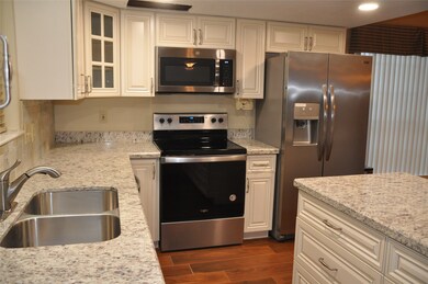 Recently renovated kitchen with stainless steel ap