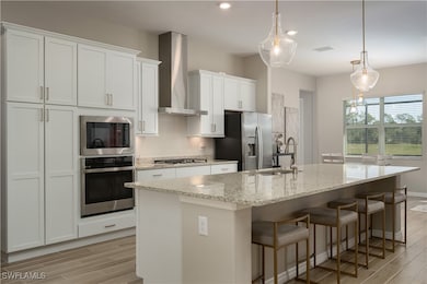 Large, oversized kitchen with generously sized isl