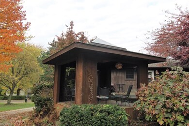 Gazebo surrounded by lovely landscaping!