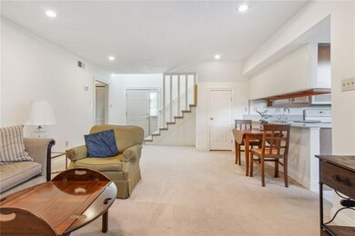 Living rm open to kitchen.