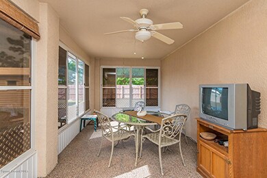 Huge screened patio with vinyl windows.