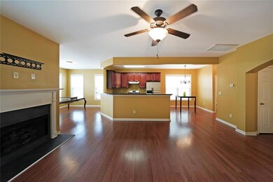 Kitchen featuring dark hardwood / wood-style floor