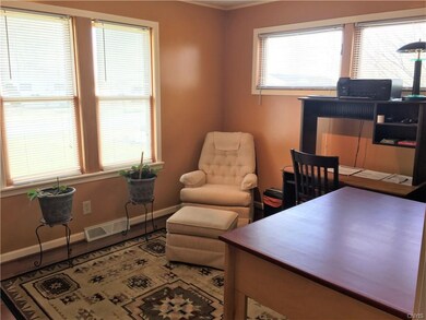 One of the spacious bedrooms, now being used as an