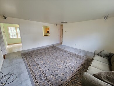 Spacious Family Room is in the center of the home.