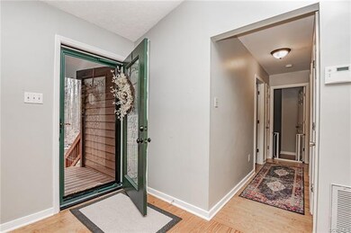 Storn door and leaded glass front door with deadbo