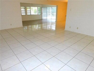 Living Room view to Family & Dining Room