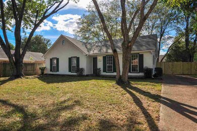 The low maintenance exterior is surrounded by lush