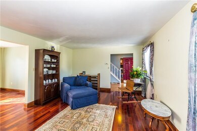 Formal Living Room Flows Into Dining Room on Left