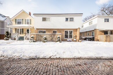 Walk in between buildings to 105A on the south side