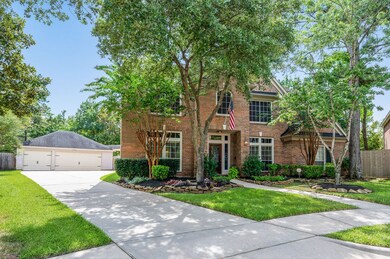 Mature trees and lush landscaping offers great curb appeal along with the detached 3-car extended garage with plenty of space for parking!