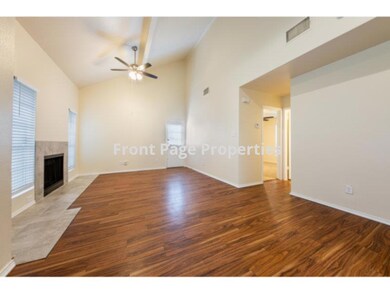 Unfurnished living room featuring wood finished f