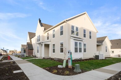 View of home's exterior featuring a residential view, roof with shingles, a chimney, and a lawn