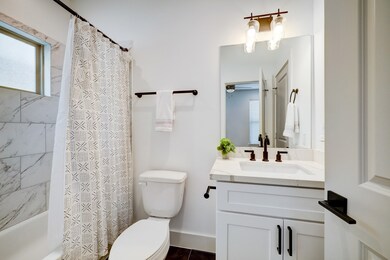 First floor secondary bathroom features shower wit