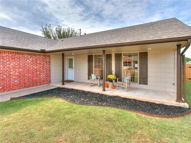 Oversized front patio, 25' long.