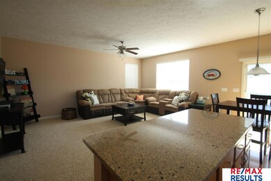 Open area between the family room and kitchen is another great space for entertaining.