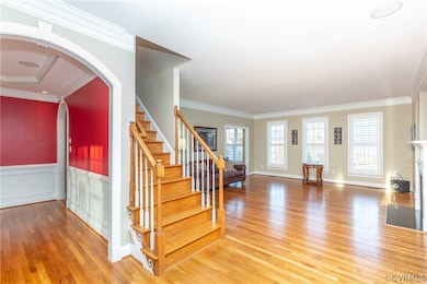 Hardwood stairs to 2nd level, view into the living
