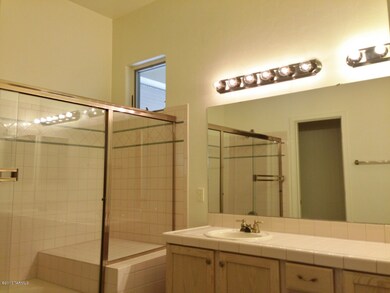MBR has double sinks, deco tile, window,