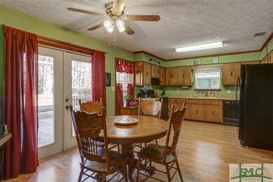 Large Eat-in Kitchen with glass door to the deck.
