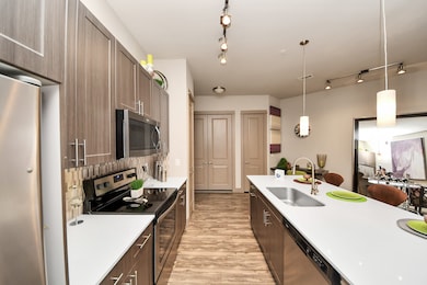 Photos are not of actual units, similar floor plan finishes, verify dimensions