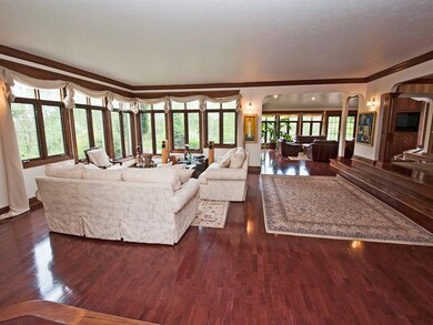Formal living room w/ Brazilian cherry flooring, s
