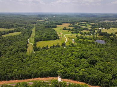 View looking West at property west of Highway K.