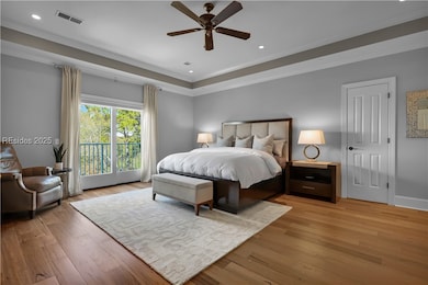 Primary Suite with crown moulding, ten foot ceilin