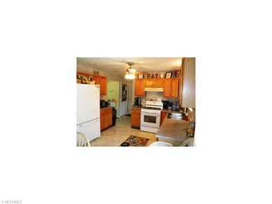 Well applianced kitchen with easy access to the ga