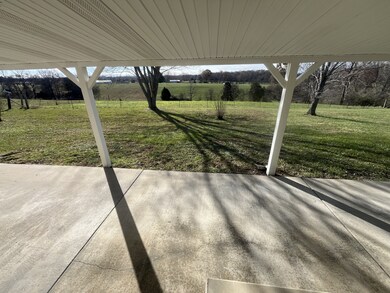 Large Covered back porch/carport for entertaining guest