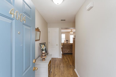 Welcoming entryway with large coat closet.