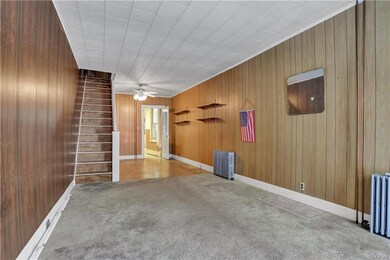 Living room with view into dining room