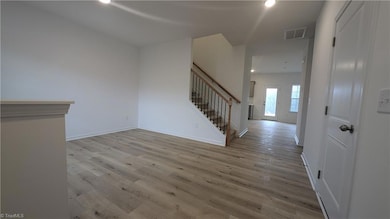 Entry way and formal dining space