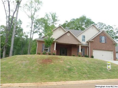 Sits majestically on cul de sac homesite.  front &