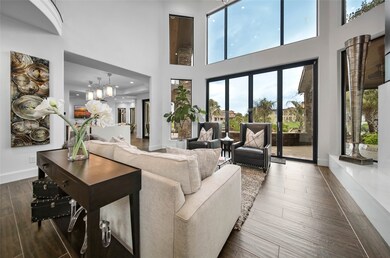 Ready to get some fresh air? Open up these custom LaCantina bifold glass doors. Easy transition to the well appointed outdoor space which is great for entertaining!