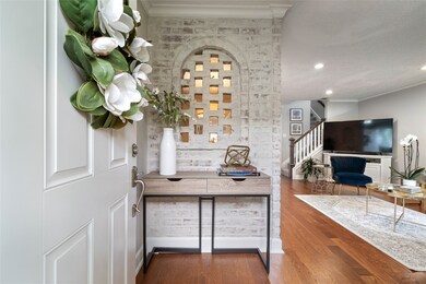 Beautiful hardwood floors welcome you into this el