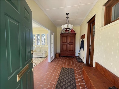 Welcoming entrance to porch/solarium.