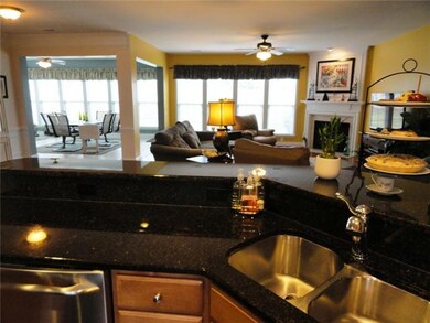 Socialize from the kitchen to the living room.  Very open floor plan.