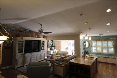Back sliding glass door leading to the lanai/pool
