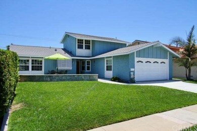 Large front yard with custom flagstone patio