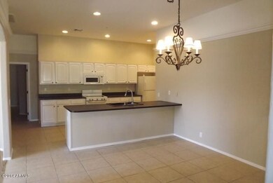 View of large dining room and kitchen