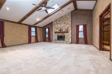 Spacious great room with vaulted ceiling, gas log 
